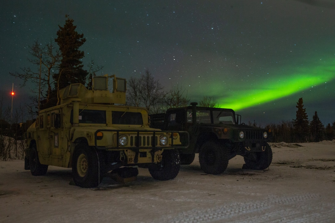 Humvees are staged in preparation for exercise Artic Edge 2020 in Fort Greely, Alaska, Feb. 20.