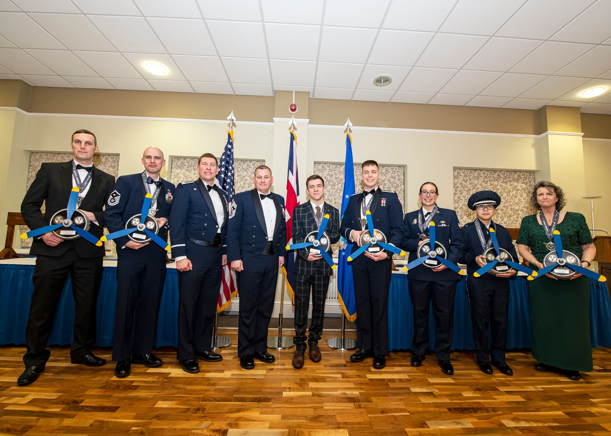 501st Combat Support Wing annual awards winners, pose for a photo with leadership from the 501st CSW, following the 2019 501st CSW annual awards ceremony, at RAF Alconbury, England, Feb. 21, 2020. The 501st CSW family came together to celebrate the Pathfinders that went above and beyond in the year of 2019. (U.S. Air Force photo by Senior Airman Eugene Oliver)