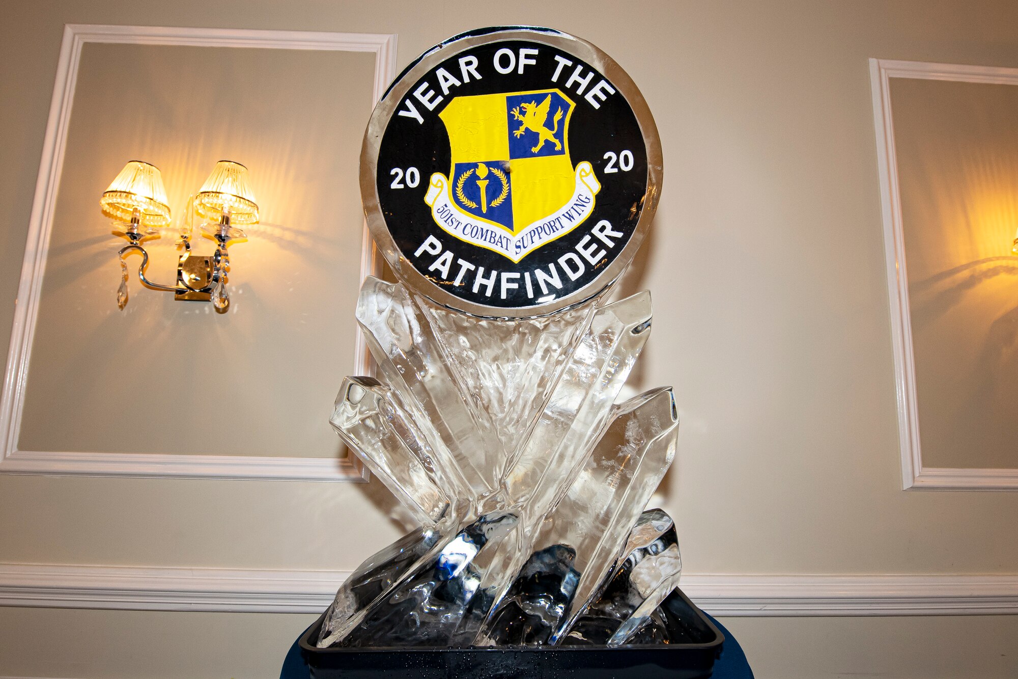 An Ice Sculpture celebrating the 501st Combat Support Wing Year of the Pathfinder, rests on a table, during the 501st CSW annual awards ceremony, at RAF Alconbury, England, Feb. 21, 2020. The 501st CSW family came together to celebrate the Pathfinders that went above and beyond in the year of 2019. (U.S. Air Force photo by Senior Airman Eugene Oliver)