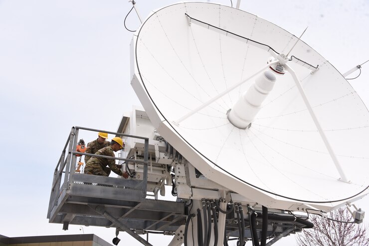 U.S. Army Satellite Operations Brigade, 53rd Signal Battalion Soldiers work on an antenna at the Wideband Satellite Operations Center at Fort Meade, Maryland in March 2018. The newly established brigade executes continuous tactical, operational and strategic satellite communications payload management in support of combatant commands, services, U.S. government agencies and international partners. (U.S. Army photo by Carrie David Campbell)