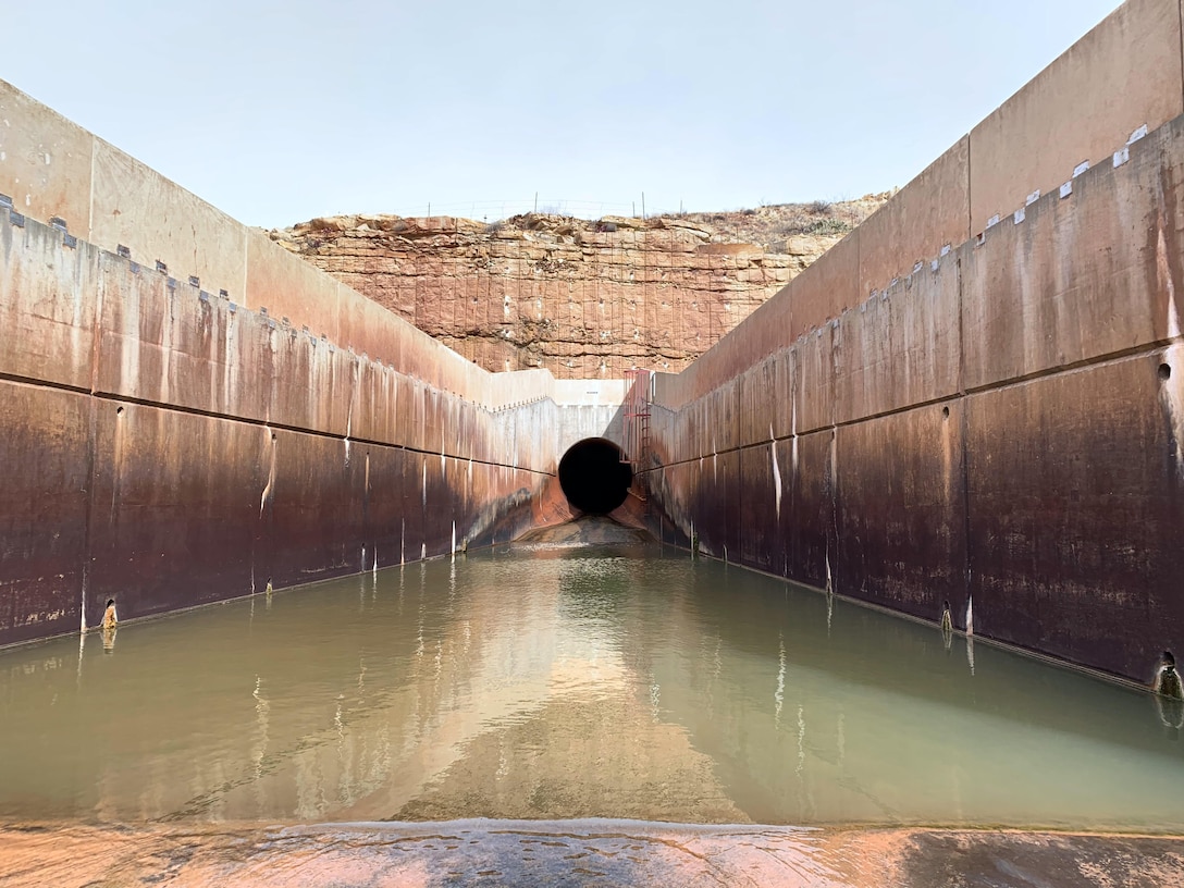 Santa Rosa Dam's outlet works, including the conduit, flip bucket, parapet walls and Pecos River discharge, as seen during the annual inspection, Feb. 10, 2020.
