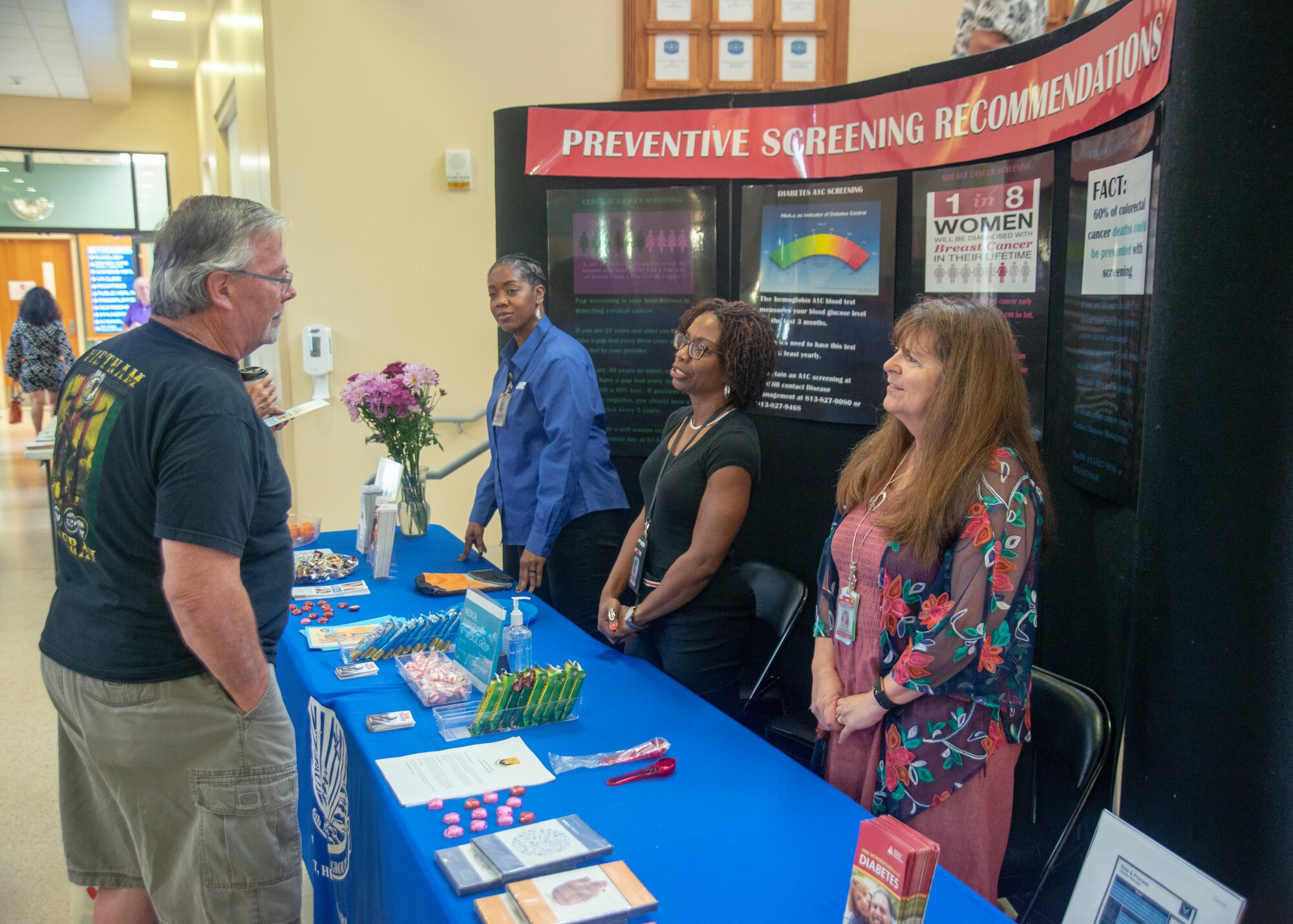 A retiree at MacDill Air Force Base asks a question about preventive screening during the annual Retirement Appreciation Day event Feb. 22, 2020, at MacDill Air Force Base, Fla.
