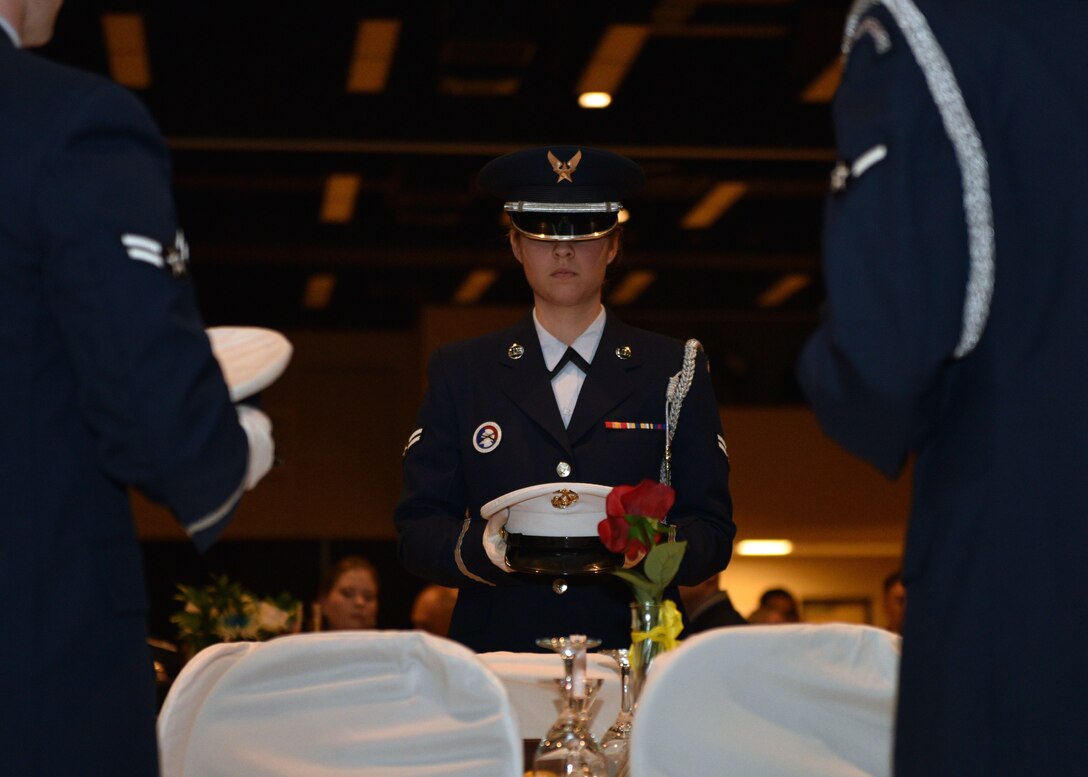 Goodfellow Air Force Base Honor Guard members set the POW/MIA table during the 27th Annual Awards Ceremony at the McNeese Convention Center in San Angelo, Texas, Feb. 21, 2020. The yearly awards were presented to members of each branch for a variety of categories. (U.S. Air Force photo by Airman 1st Class Robyn Hunsinger)