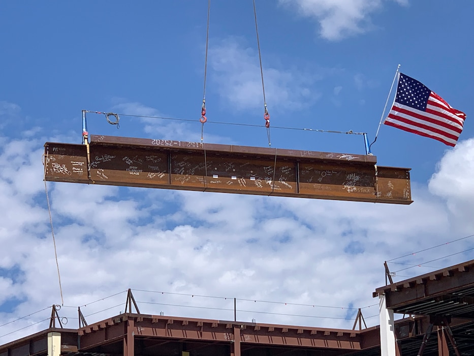 A crane places the final structural beam in place during a Topping Out ceremony at the NNSA Albuquerque Complex, Aug. 6, 2019. Photo by Garry Vollbrecht.