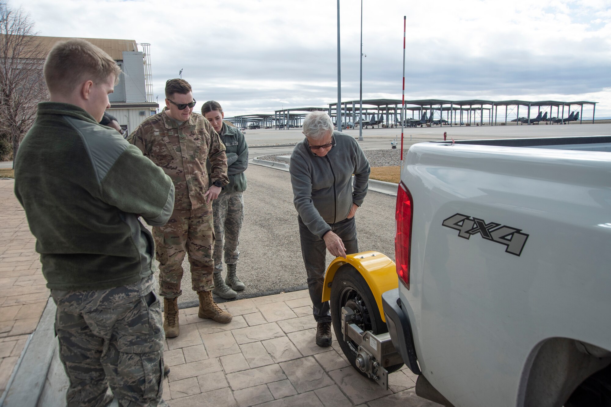 Don Halliday, Halliday Technologies owner, teaches the Airmen of the 366th Operations Support Squadron how to operate the Real Time Traction Tool Feb. 14, 2020, at the flight line on Mountain Home Air Force Base, Idaho. This marks the first day of training and calibration for the Airmen of the 366th OSS. (U.S. Air Force photo by Airman 1st Class Akeem K. Campbell)