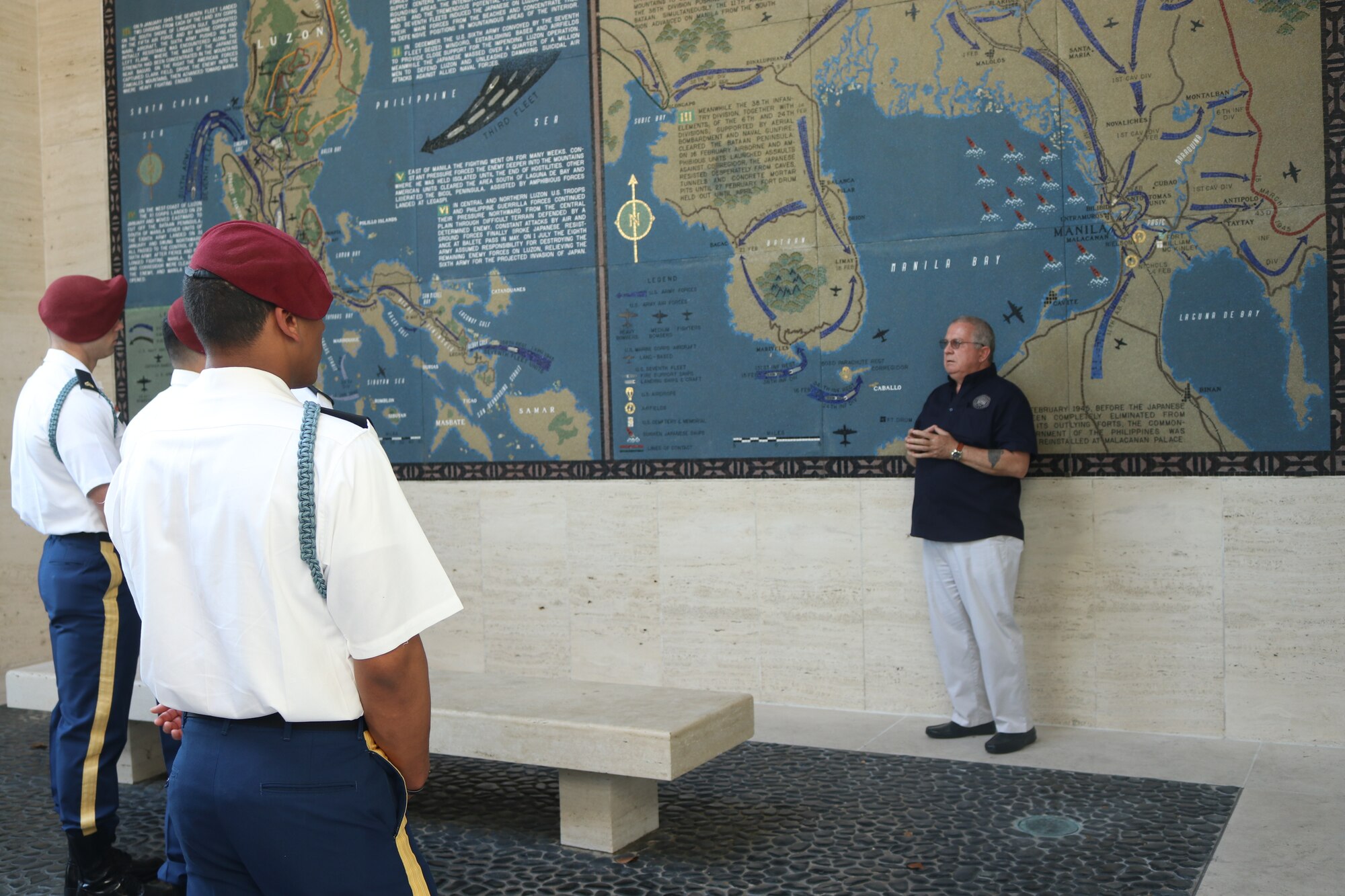 Bobby Bell, American Battle Monuments Commission deputy superintendent, talks to soldiers from the 2nd Battalion, 503rd Infantry Regiment in Vicenza, Italy, during the 75th anniversary of the retaking of Corregidor Island ceremony at the Manila American Cemetery in Manila, Philippines, Feb. 17, 2020.