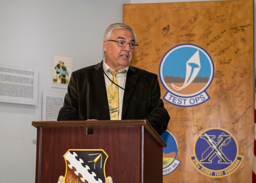 George Welsh, Air Force Flight Test Museum Director, provides opening remarks prior to a special presentation ceremony for Dr. Eileen Bjorkman, Air Force Test Center Executive Director, at Edwards Air Force Base, California, Feb. 25. Bjorkman recently donated $50,000 to Flight Test Museum Foundation to sponsor the RF-4C (#004) and help directly fund construction of the new Flight Test Museum being built outside the West Gate at Edwards Air Force Base. (Air Force photo by Giancarlo Casem)