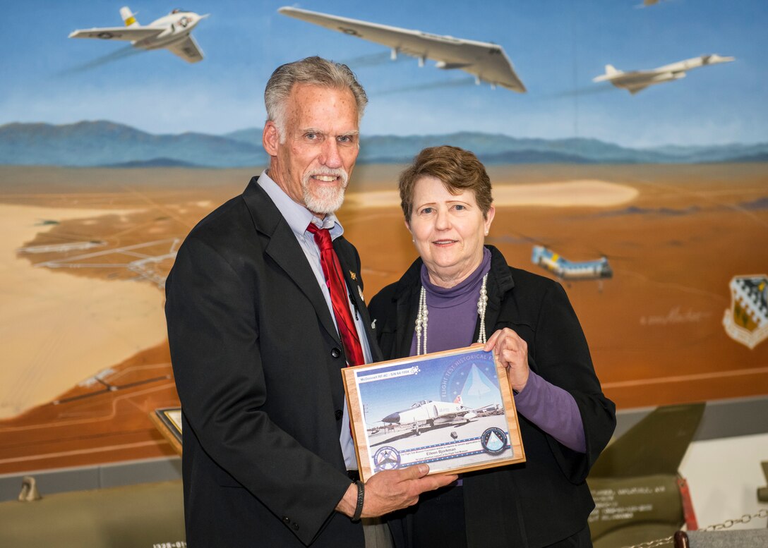 Art Thompson, Flight Test Museum Foundation Chairman, and Dr. Eileen Bjorkman, Air Force Test Center Executive Director, pose for a photo at Edwards Air Force Base, California, Feb. 25. Bjorkman recently donated $50,000 to Flight Test Museum Foundation to sponsor the RF-4C (#004) and help directly fund construction of the new Flight Test Museum being built outside the West Gate at Edwards Air Force Base. (Air Force photo by Giancarlo Casem)