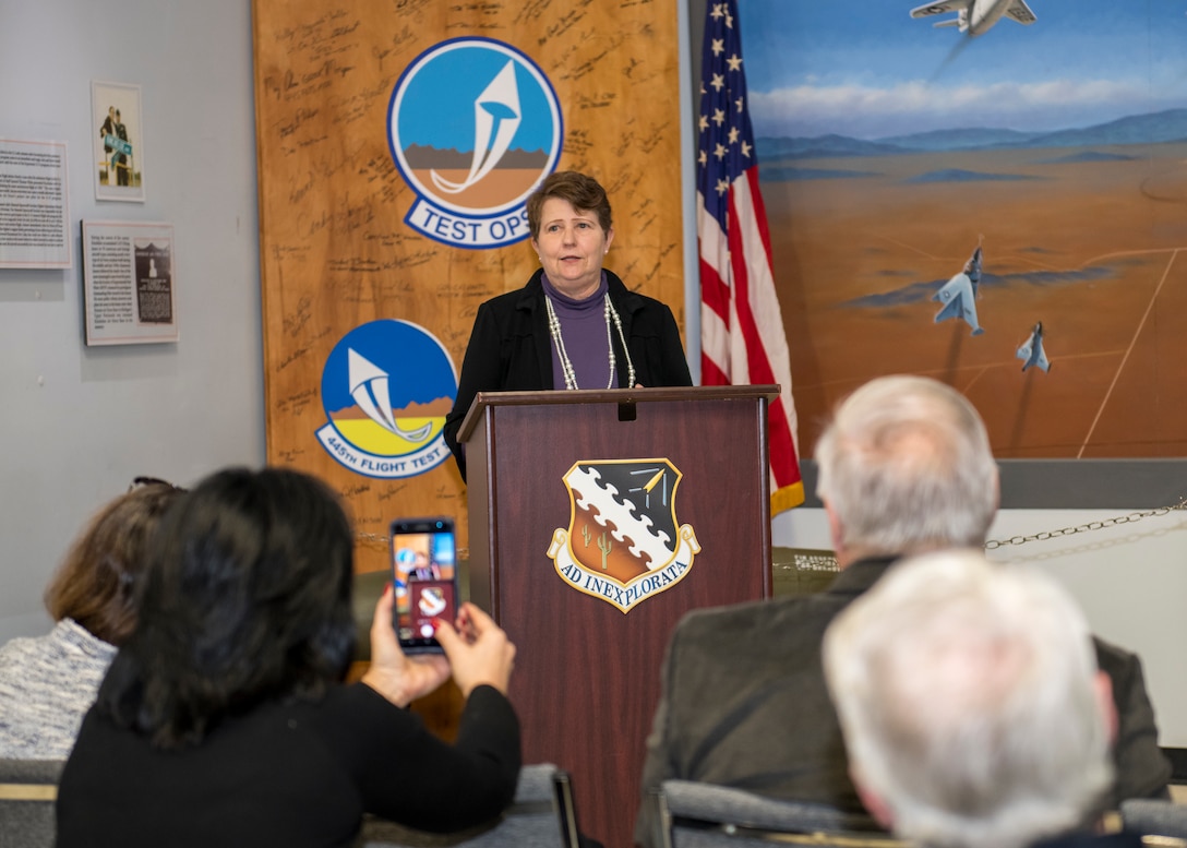Dr. Eileen Bjorkman, Air Force Test Center Executive Director, speaks at special ceremony in honor of her $50,000 donation to the Flight Test Museum Foundation at Edwards Air Force Base, California, Feb. 25. Bjorkman’s donation to the Flight Test Museum Foundation will be used to sponsor the RF-4C (#004) and help directly fund construction of the new Flight Test Museum being built outside the West Gate at Edwards Air Force Base. (Air Force photo by Giancarlo Casem)