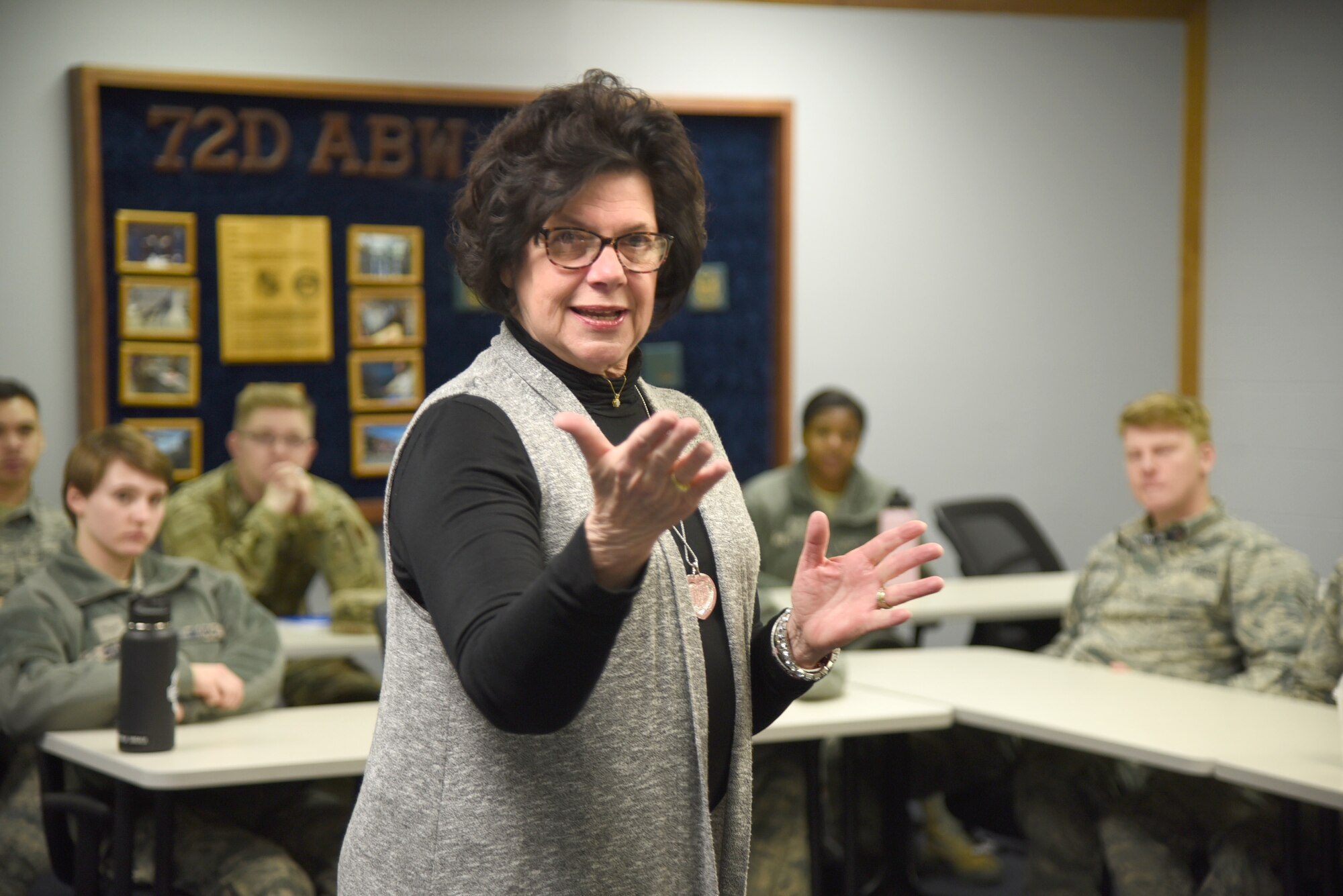 Pam Kloiber, founder of the Tinker Home Away From Home program, speaks to Airmen at the First Term Airman Center about joining the program Feb. 10. The program has grown substantially from its inception in 2013, serving a total of 758 Airmen and Sailors at Tinker. The program focuses on new Airmen and Sailors, pairing them with host families from the surrounding communities, which gives them a somewhat familiar place to go outside their dorms and the Tinker gates to relax or share a home-cooked meal and form bonds, friendships and lasting memories. (U.S. Air Force photo/Kelly White)