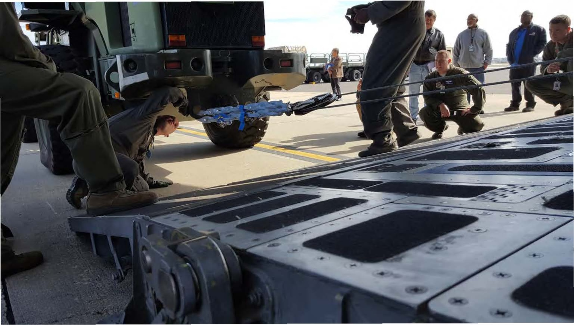 Members of the Air Force Research Laboratory’s Advanced Power Technology Office, Air Mobility Command, Air Force Special Operations Command, Team Charleston, Air Transportability Test Loading Activity, Robins Air Force Base, Warner Robins, Georgia, Boeing and cable designer Samson Rope met on Joint Base Charleston to conduct an operational evaluation of new synthetic winch cables. (Courtesy photo)