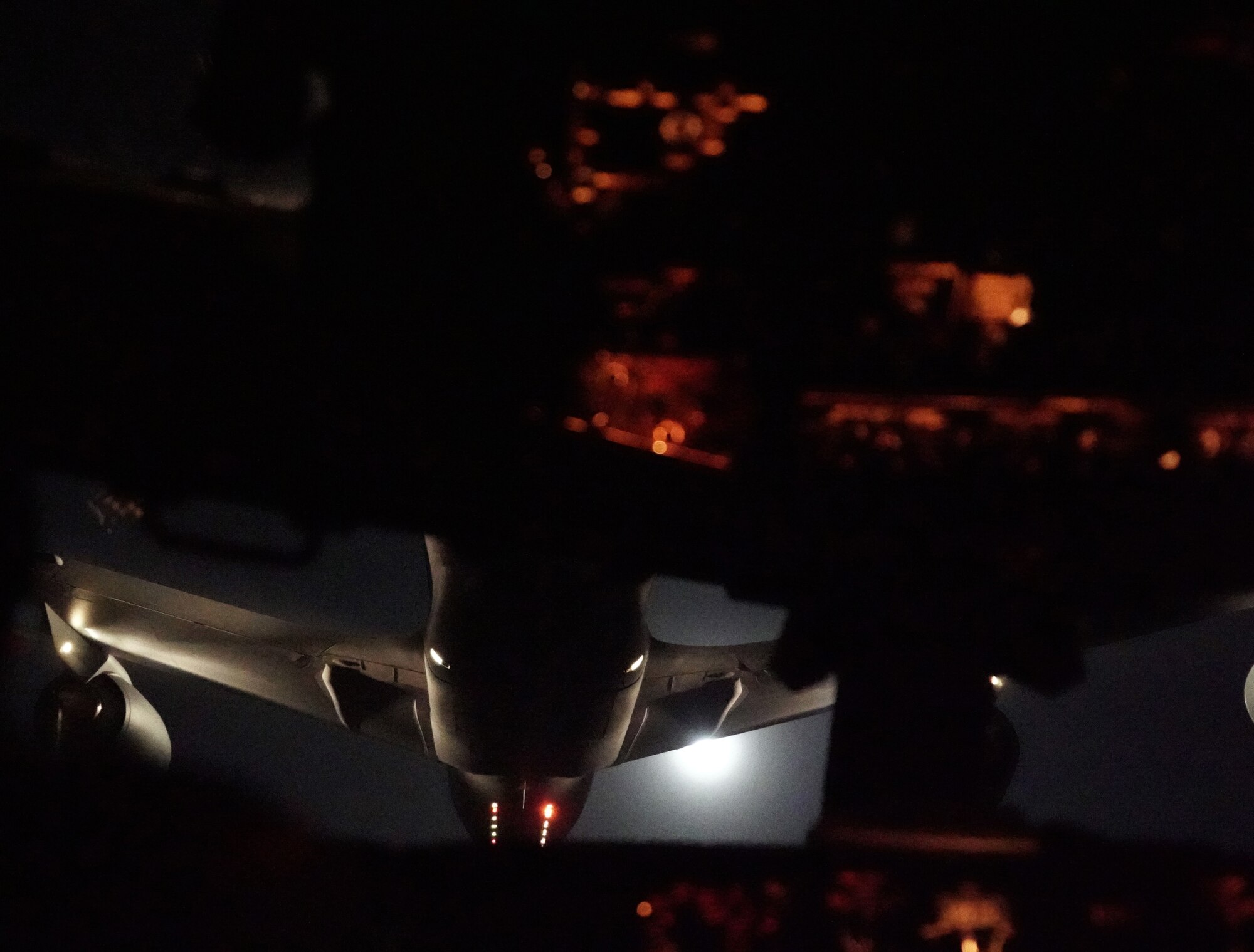 A KC-135 conducts air refueling with a E-3G Sentry.