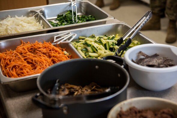 Ingredients, for the Korean dish bibimbap, sit on a counter during a cooking class at the Sonlight Inn kitchen at Kunsan Air Base, Republic of Korea, Feb. 21, 2020. This wing resiliency day offered a wide range of events including fitness opportunities, cooking demonstrations, reintegration workshop, language classes, and motivational speakers. (U.S. Air Force photo by Senior Airman Jessica Blair)