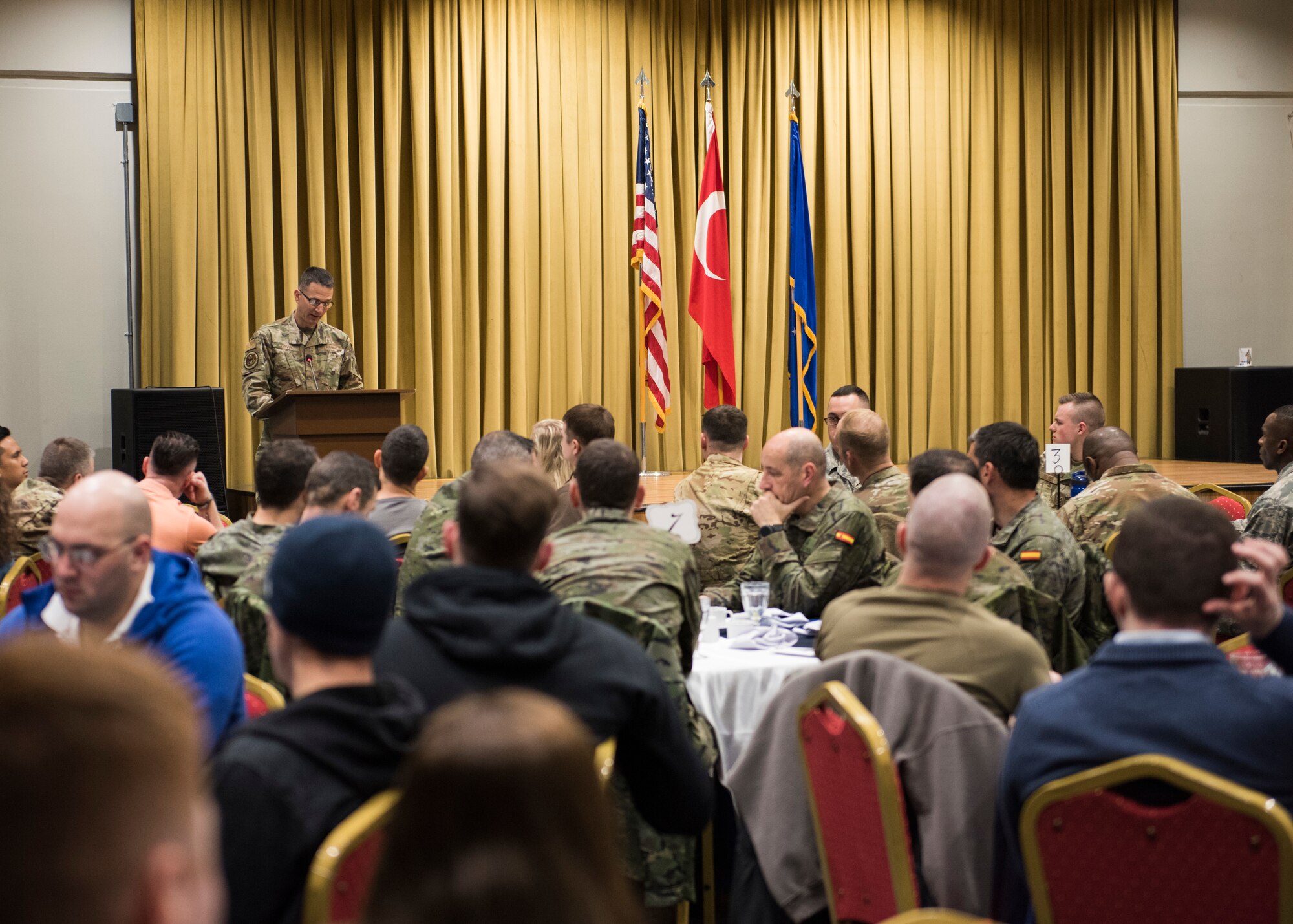 U.S. Air Force Col. Trent Davis, U.S. Air Forces in Europe and Air Forces Africa command chaplain, presides over the National Prayer Breakfast, Feb. 20, 2020, at Incirlik Air Base, Turkey. U.S. and Spanish service members, as well as civilian employees, attended the breakfast. (U.S. Air Force photo by Senior Airman Matthew Angulo)