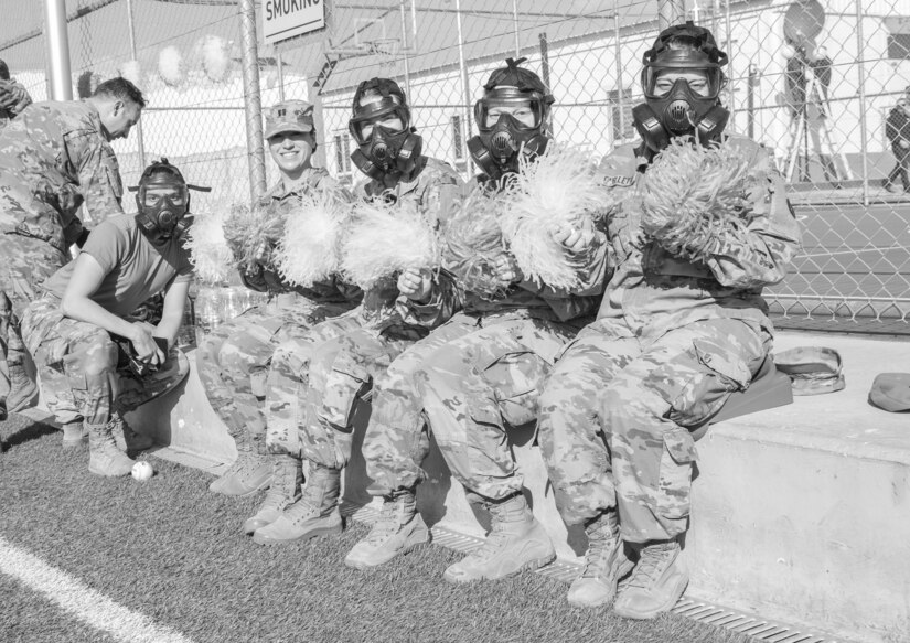 A U.S. Army Soldier, with 655 Regional Support Group, 316 Sustainment Command (Expeditionary), 377 Theater Sustainment Command,  runs toward home plate during a game of gas mask baseball Feb. 12, 2020 at Joint Training Center-Jordan, paying tribute to former service members who used the sport to train for chemical warfare during WWI. We still have the greatest Army in the world. We serve the people of the United States and we are going to protect them with our lives if that is what it comes to. (U.S. Army photo by Sgt. 1st Class Shaiyla B. Hakeem)