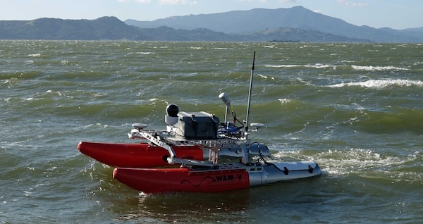 U.S. Army dive team members pause for a photo during training on the U.S. Army Engineer Research and Development Center's Coastal and Hydraulics Laboratory's Multifunctional Assessment Reconnaissance Vessel II