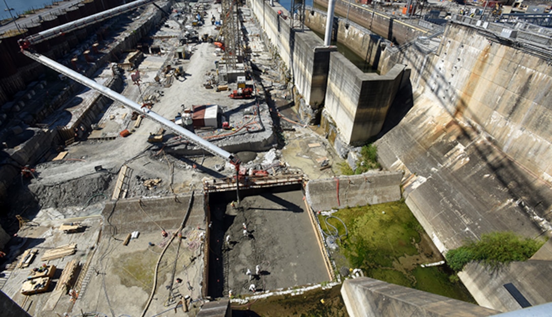 The U.S. Army Corps of Engineers Nashville District places concrete for the first monolith on the Chickamauga Lock Replacement Project Oct. 17, 2019 on the Tennessee River in Chattanooga, Tennessee. At the Chickamauga Lock Replacement Project, aa Tennessee Valley Authority project, the Nashville District is currently executing the lock chamber contract for the new 110-foot by 600-foot navigation lock, which includes 285,000 cubic yards of reinforced concrete. A conveyer system is placing concrete inside the coffer dam from the batch plant, a distance of about 900 feet in about a minute and a half. (USACE Photo by Lee Roberts)