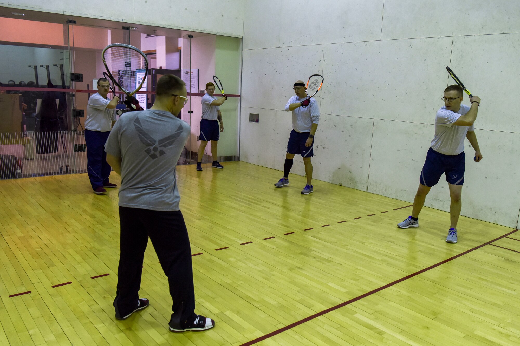 U.S. Air Force Chief Master Sgt. Aaron Agner, 8th Operation Support Squadron superintendent, teaches resiliency class attendees racquetball basics during Airman’s Choice Day at Kunsan Air Base, Republic of Korea, Feb. 21, 2020. During the resiliency day, Airmen had the opportunity to attend a wide variety of classes and workshops. (U.S. Air Force photo by Senior Airman Jessica Blair)