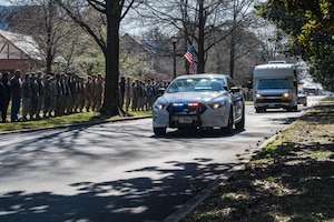 Approximately 1,000 Airmen, service members and civilians representing Joint Base Langley-Eustis, Virginia and Air Combat Command, rendered a final salute to U.S. Air Force Lt. Col. Paul K. "Tabs" Voss and his family. Voss, a 25-year veteran who passed away while deployed to Afghanistan in support of Operation Freedom's Sentinel, was the ops division branch chief at ACC Headquarters. This marks the end of Voss' watch as we honor his service, dedication and sacrifice to our country. (U.S. Air Force photo by Airman 1st Class Sarah Dowe)