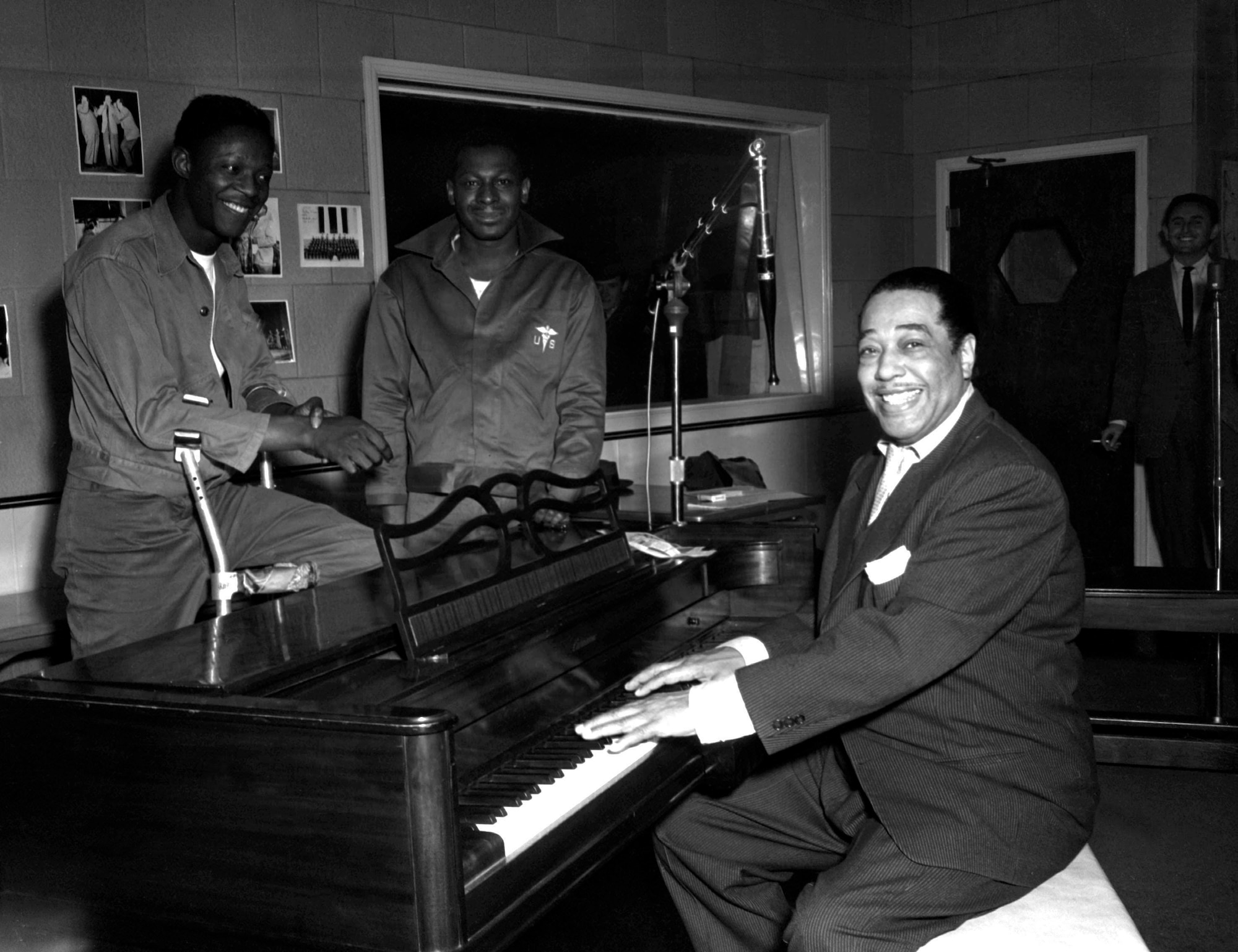 Jazz pianist Duke Ellington poses Nov. 3, 1954, at the KFG Radio Studio for Fitzsimons Army Medical Center in Aurora, Colorado. Ellington played three shows at Travis Air Force Base, California, in the 1950s and 1960s, one of which was released as a live album in the 1980s.(U.S. Army photo)