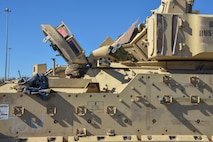 Pvt. Carlos Lopez, a Bradley Fighting Vehicle system maintainer assigned to the 4th Squadron, 10th Cavalry Regiment, Fort Carson, Colorado, drives a Bradley Fighting Vehicle tank at Joint Base Charleston’s Naval Weapons Station, S.C., Feb. 14, 2020. The 841st Transportation Battalion and the 3rd Armored Brigade Combat Team partnered to off load equipment from the shipping vessel named the Green Lake for a return to home station. The cargo was diverted to Joint Base Charleston and other ports on the east coast because of congestion at the Port of Beaumont, Texas.