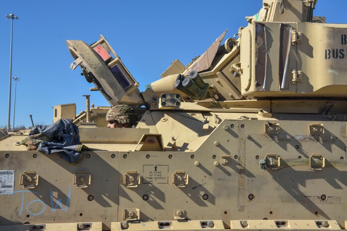 Pvt. Carlos Lopez, a Bradley Fighting Vehicle system maintainer assigned to the 4th Squadron, 10th Cavalry Regiment, Fort Carson, Colorado, drives a Bradley Fighting Vehicle tank at Joint Base Charleston’s Naval Weapons Station, S.C., Feb. 14, 2020. The 841st Transportation Battalion and the 3rd Armored Brigade Combat Team partnered to off load equipment from the shipping vessel named the Green Lake for a return to home station. The cargo was diverted to Joint Base Charleston and other ports on the east coast because of congestion at the Port of Beaumont, Texas.