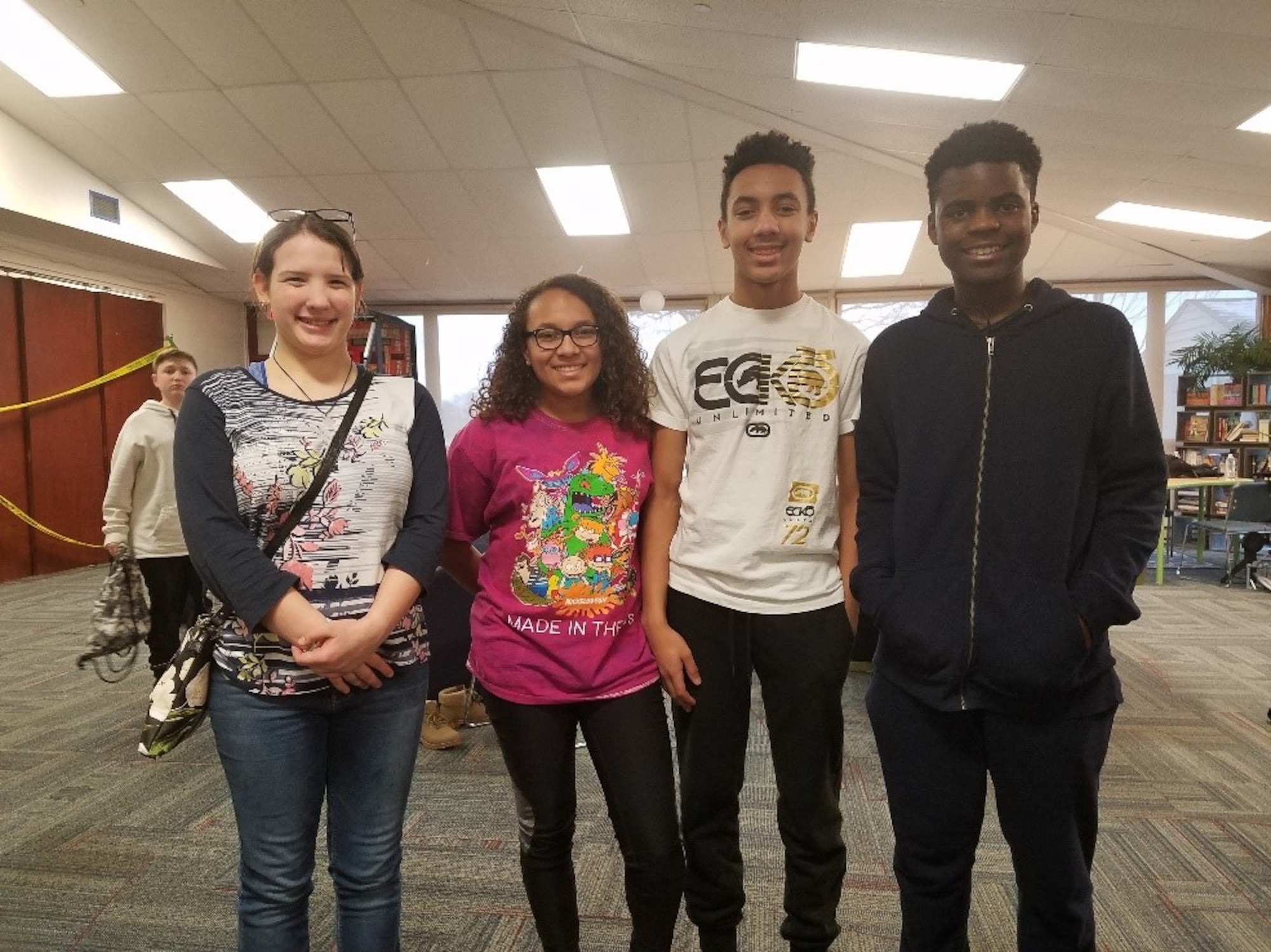 From left to right are the Keystone Club board members for the Prairies Youth Center: Naomi Driesenga, secretary; Kellesa Ogan, food manager; Kadell Ogan, president; Aaron Alexander, treasurer. U.S. Air Force photo/Laura McGowan)