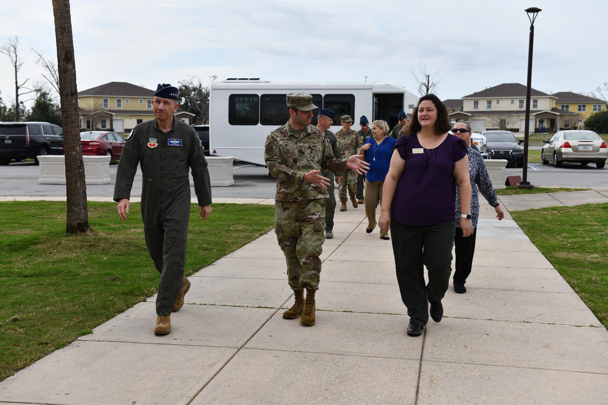 U.S. Air Force Gen. Mike Holmes, the commander of Air Combat Command (left), walks up to the Child and Youth Program Center with U.S. Air Force Maj. Jesse Calland, 325th Force Support Squadron commander (middle), and Cynthia Dedeo, 325th FSS recreation specialist at Tyndall Air Force Base, Florida, Feb. 25, 2020. Holmes toured Tyndall and spoke with leaders and Airmen about what the future has in store for the 325th Fighter Wing. (U.S. Air Force photo by Senior Airman Stefan Alvarez)
