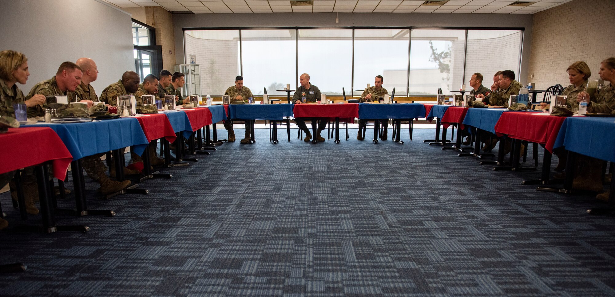 U.S. Air Force Gen. Mike Holmes, the commander of Air Combat Command (center), has lunch with 325th Fighter Wing leaders during a tour at Tyndall Air Force Base, Florida, Feb. 25, 2020. Gen. Holmes spoke with leadership about the future of ACC and how Tyndall fits into that vision. (U.S. Air Force photo by Staff Sgt. Magen M. Reeves)