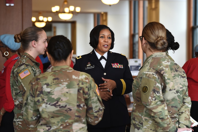U.S. Army Reserve Brig. Gen. Patricia Wallace, Deputy Commanding General, 88th Readiness Division, speaks with Soldiers, assigned to the 85th U.S. Army Reserve Support Command, during the Operation HerStory all-female Honor Flight news conference at Pritzker Military Library, in Chicago, February 25, 2020.