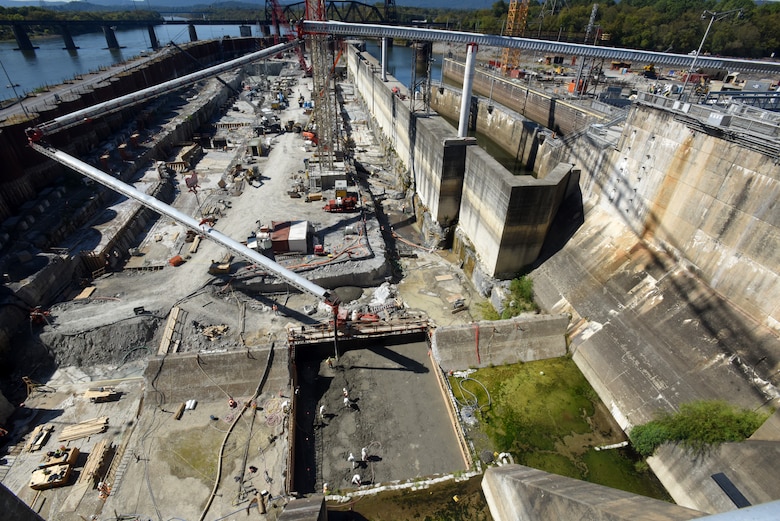 The U.S. Army Corps of Engineers Nashville District places concrete for the first monolith on the Chickamauga Lock Replacement Project Oct. 17, 2019 on the Tennessee River in Chattanooga, Tennessee. At the Chickamauga Lock Replacement Project, aa Tennessee Valley Authority project, the Nashville District is currently executing the lock chamber contract for the new 110-foot by 600-foot navigation lock, which includes 285,000 cubic yards of reinforced concrete. A conveyer system is placing concrete inside the coffer dam from the batch plant, a distance of about 900 feet in about a minute and a half. (USACE Photo by Lee Roberts)