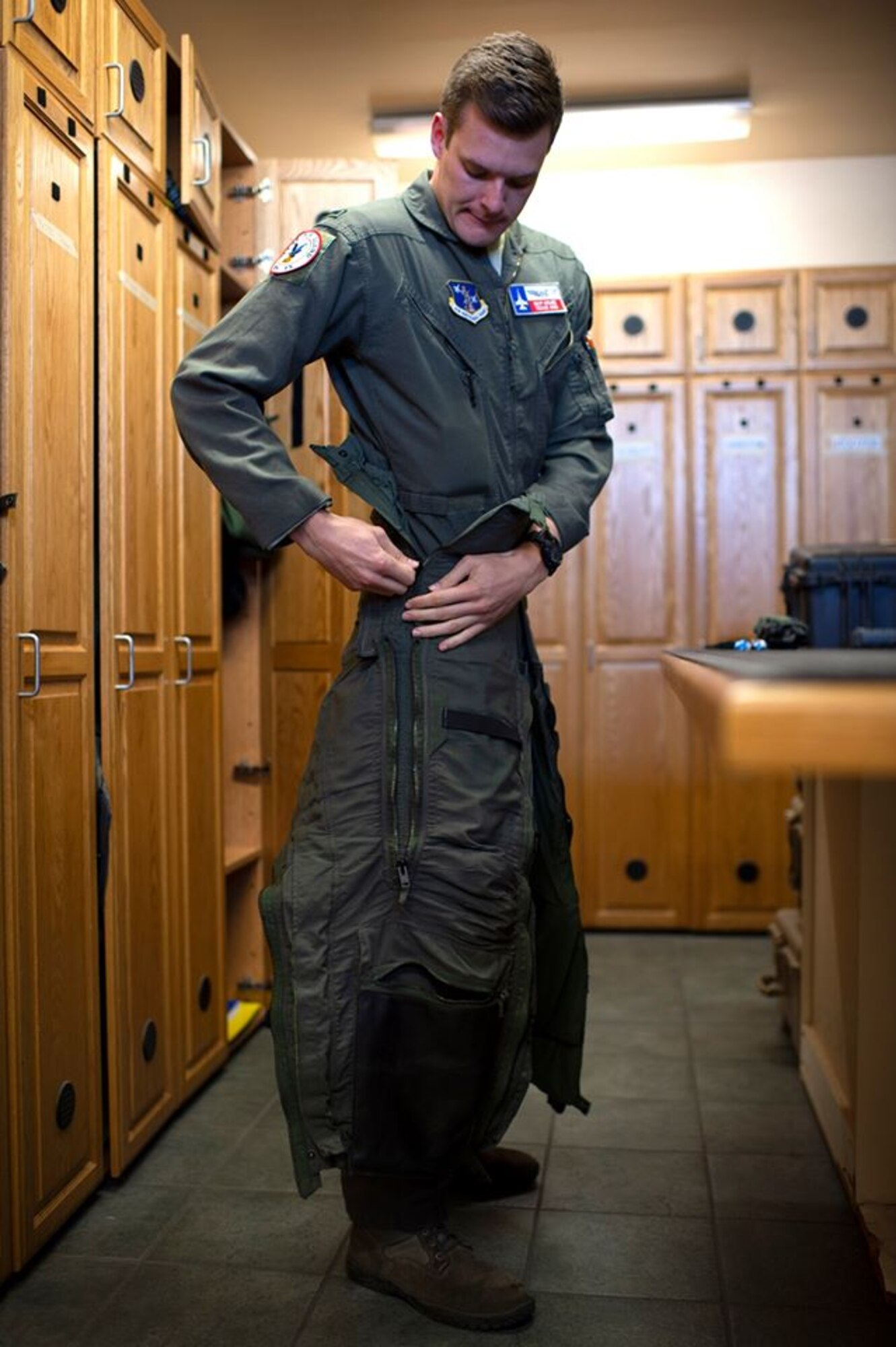 Pilot puts on flight suit