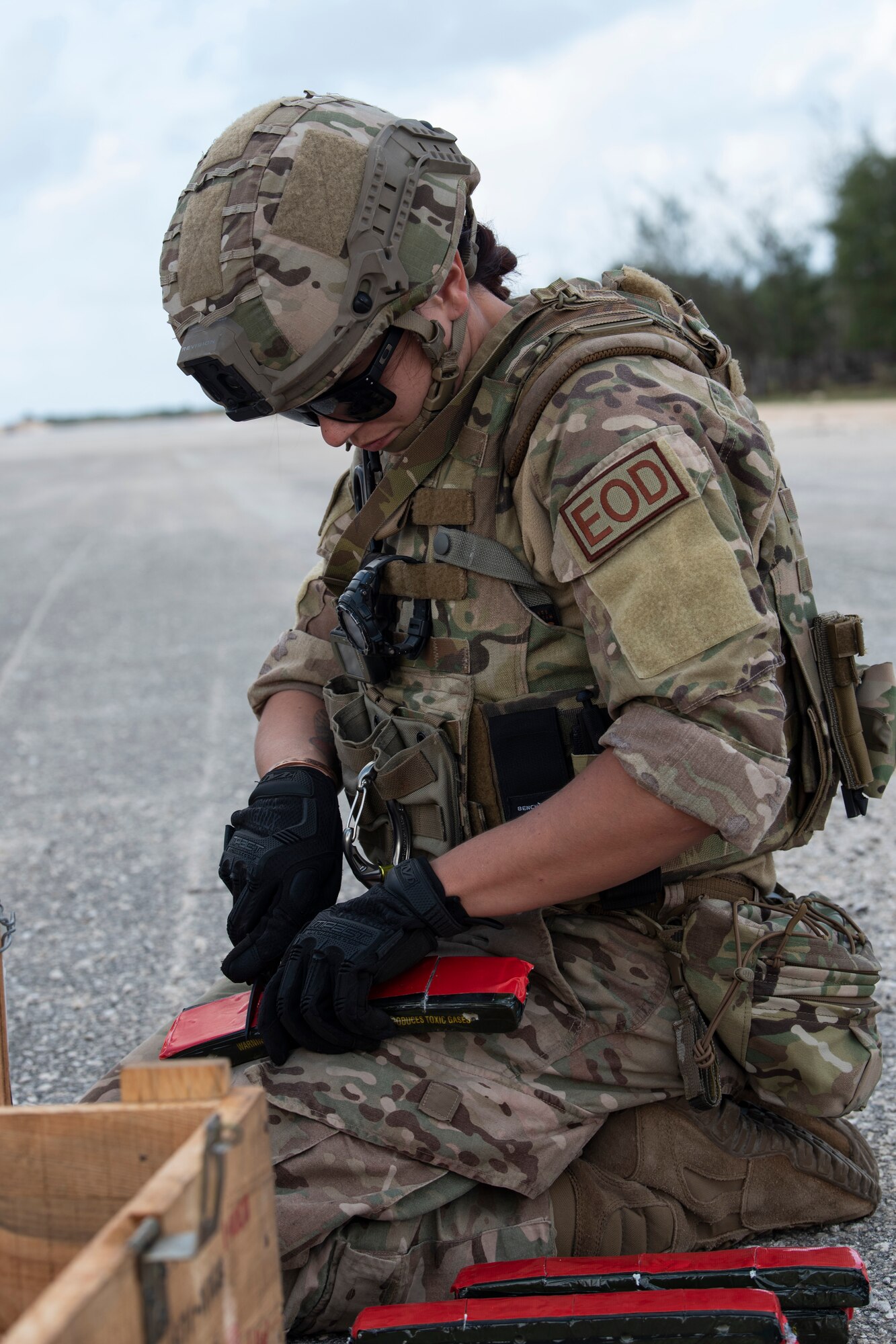 An Explosive Ordnance Disposal technician with the 36th Civil Engineer Squadron prepares her equipment during a Rapid Airfield Damage Repair (RADR) Exercise at Andersen Air Force Base, Feb. 12, 2020.