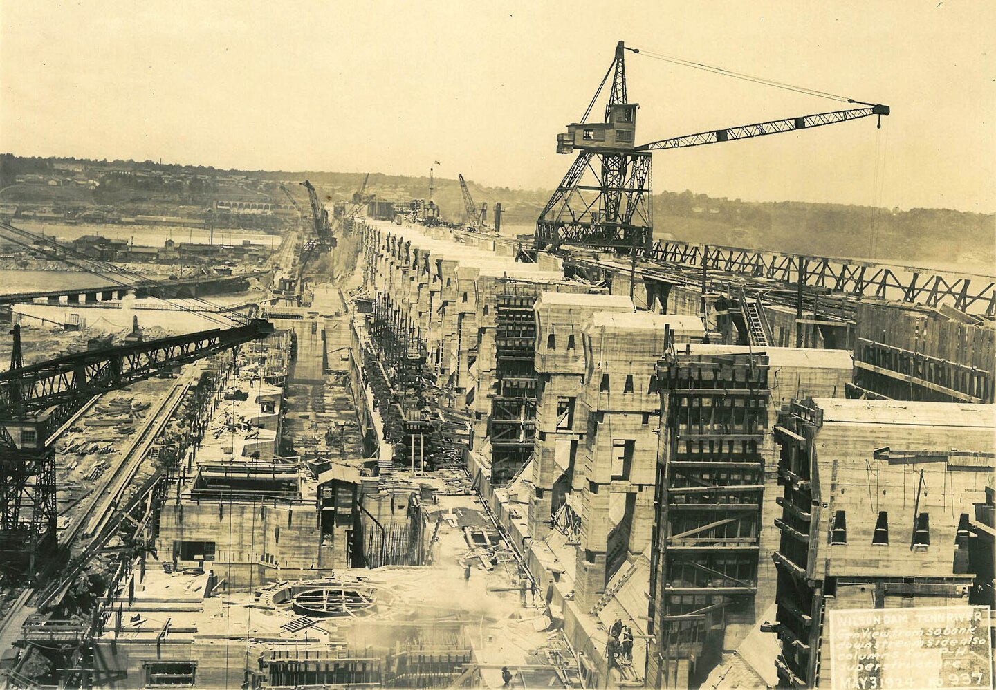 U.S. Army Corps of Engineers Nashville District Historical Photo - This is a view from the south bank of the Tennessee River of ongoing construction of Wilson Dam May 3, 1924.