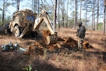 Soldiers from the 861st Engineer Support Company, Rhode Island National Guard, participate in Task Force Spartan Jan. 9-29, 2020, at the Joint Readiness Training Center at Fort Polk, La. They provided a variety of force protection measures in support of friendly forces, which included constructing berms for artillery and anti-tank ditches and route clearance missions.