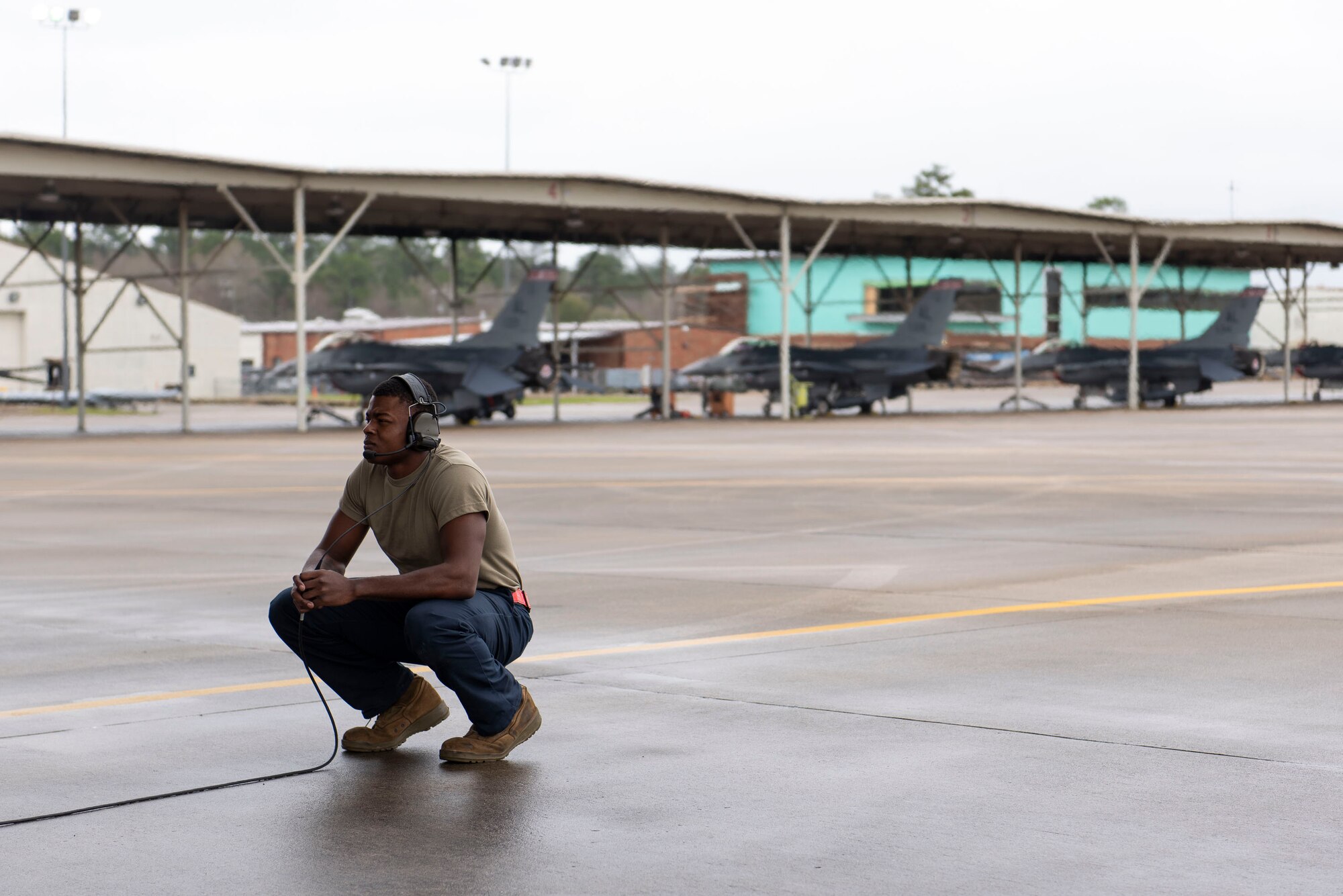 U.S. Air Force Airman 1st Class Jadin Jackson, a crew chief assigned to the 187th Fighter Wing's Maintenance Squadron, Alabama Air National Guard, prepares an F-16 Fighting Falcon aircraft prior to a training sortie to commemorate Black History Month and honor the Tuskegee Airmen February 18, 2020 at Dannelly Field, Ala. A KC-135 Stratotanker from the 92nd Air Refueling Wing, Fairchild Air Force Base, Wash., also piloted and crewed by black Airmen, refueled the four F-16 Fighting Falcons during the mission. (US Air National Guard photos by Jared Rand)