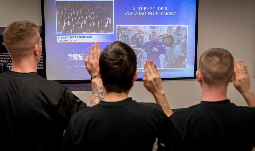 Local Future Soldiers receive enlistment oath from orbiting astr