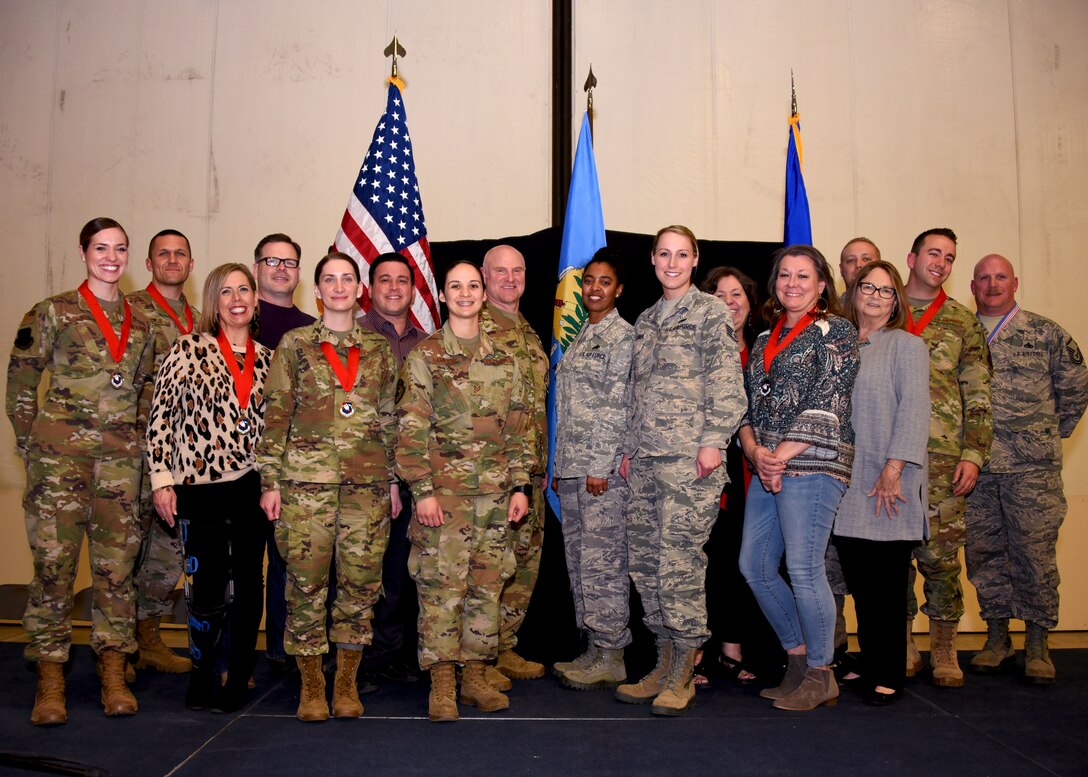 The 2019 507th Air Refueling Wing annual award winners stand for a photograph with 507th ARW leaders and community partners Feb. 8, 2020, at Tinker Air Force Base, Oklahoma. (U.S. Air Force photo by Tech. Sgt. Samantha Mathison)