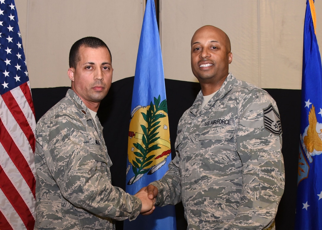 Senior Master Sgt. Christopher Webb, 507th Logistics Readiness Squadron, is recognized as the 2019 507th LRS Logistics Professional of the Year by Maj. Damien Miller, 507th LRS commander, during the 2019 Annual Awards Banquet Feb. 8, 2020, at Tinker Air Force Base, Oklahoma. (U.S. Air Force photo by Tech. Sgt. Samantha Mathison)