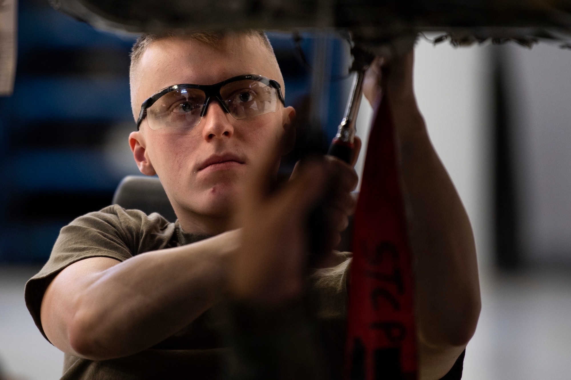 U.S. Air Force Senior Airman Tanner Sterner, 52nd Maintenance Squadron aerospace propulsion journeyman, manually rotates jet engine components during an inspection at Spangdahlem Air Base, Germany, Feb. 25, 2020. Sterner helped check for discrepancies to prevent issues arising. The 52nd MXS Propulsion Flight recently won the Air Force Chief of Safety: Aviation Safety award for their excellent record of quality assurance. (U.S. Air Force photo by Airman 1st Class Valerie Seelye)
