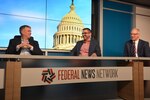 Defense Intelligence Agency Deputy Chief Information Officer Doug Cossa, center, participates with other panelist in an interview with the Federal News Network, Feb. 19. (Photo by Ally Rogers, DIA)