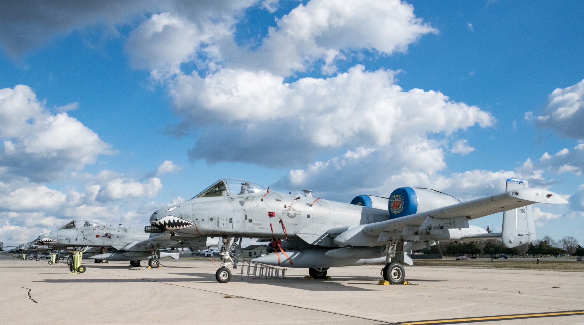 Numerous A-10C Thunderbolt II assigned to the 23d Wing, Moody Air Force Base, Ga., park on the south ramp, Dover AFB, Delaware on Jan. 8, 2020. The aircraft and support personnel made a pit stop at Dover AFB. (U.S. Air Force photo by Roland Balik)
