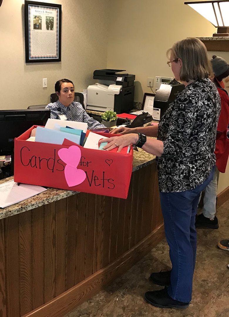 Employee can box of valentines to receptionist at veterans home