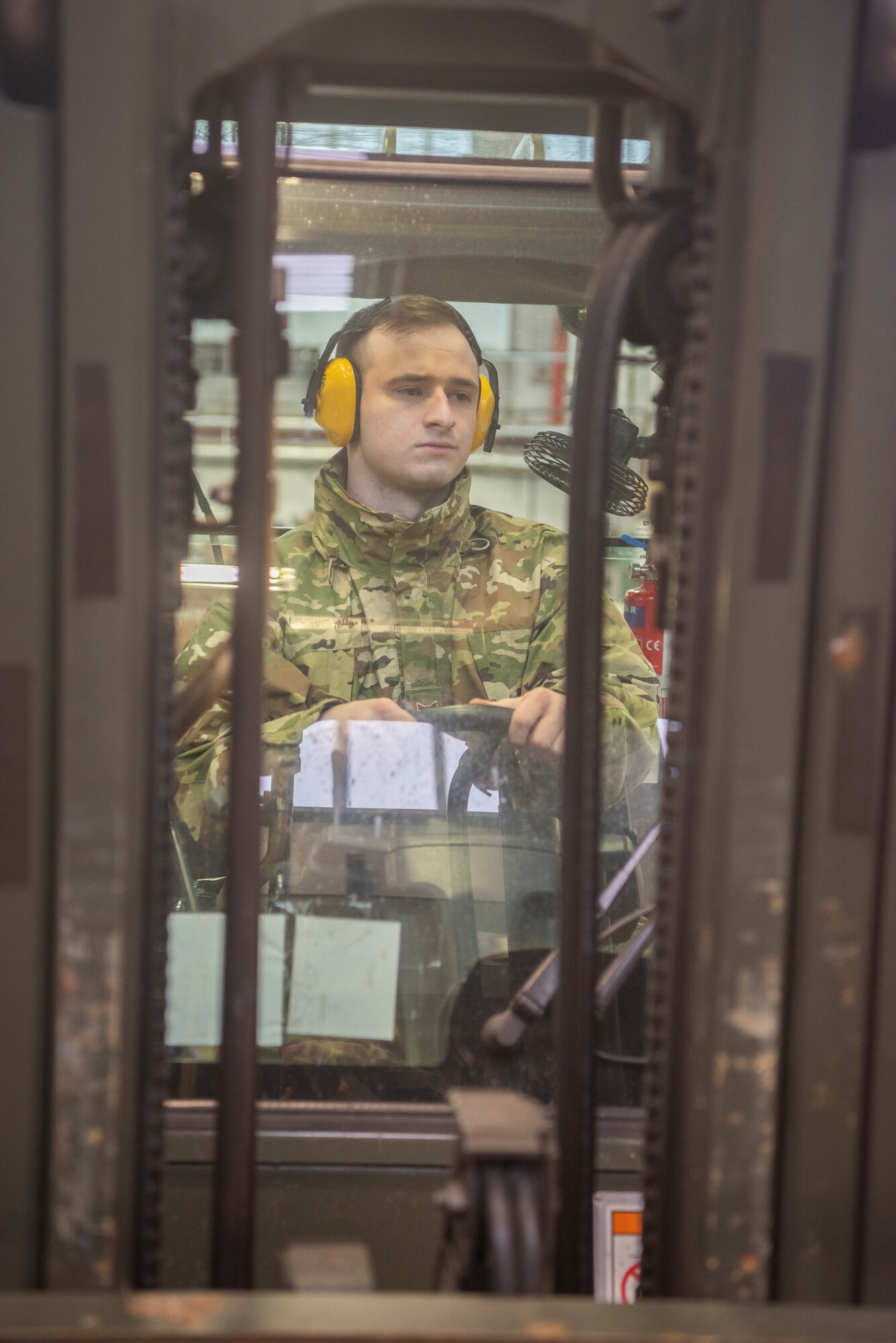 Airman 1st Class Nicholas Doepker, 100th Logistics Readiness Squadron in bound cargo specialist, operates a forklift Feb. 27, 2020, at RAF Mildenhall, England. From aircraft parts to chemical warfare equipment, Airmen in the traffic management office manage the inventory of equipment and supplies necessary for the base to operate. (U.S. Air Force photo by Airman 1st Class Joseph Barron)