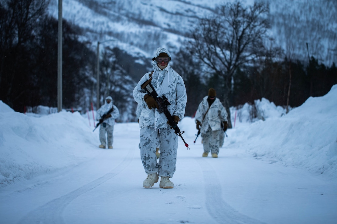 U.S. Marines with Charlie Company, 2nd Law Enforcement Battalion, II Marine Expeditionary Force Information Group, participate in a foot patrol during cold-weather training at Bjerkvik, Norway, Feb. 23, 2020. Marines are in Norway preparing for Exercise Cold Response, a Norwegian-led exercise designed to enhance military capabilities and allied cooperation in high-intensity warfighting in a challenging arctic environment. (U.S. Marine Corps photo by Cpl. Isaiah Campbell)