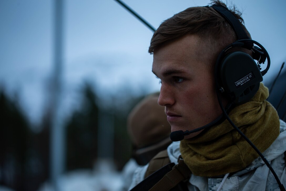 U.S. Marine Corps Lance Cpl. Samuel Tollett, a field radio operator with Charlie Company, 2nd Law Enforcement Battalion, II Marine Expeditionary Force Information Group, prepares for a foot patrol during cold-weather training at Bjerkvik, Norway, Feb. 23, 2020. Marines are in Norway preparing for Exercise Cold Response, a Norwegian-led exercise designed to enhance military capabilities and allied cooperation in high-intensity warfighting in a challenging arctic environment. (U.S. Marine Corps photo by Cpl. Isaiah Campbell)
