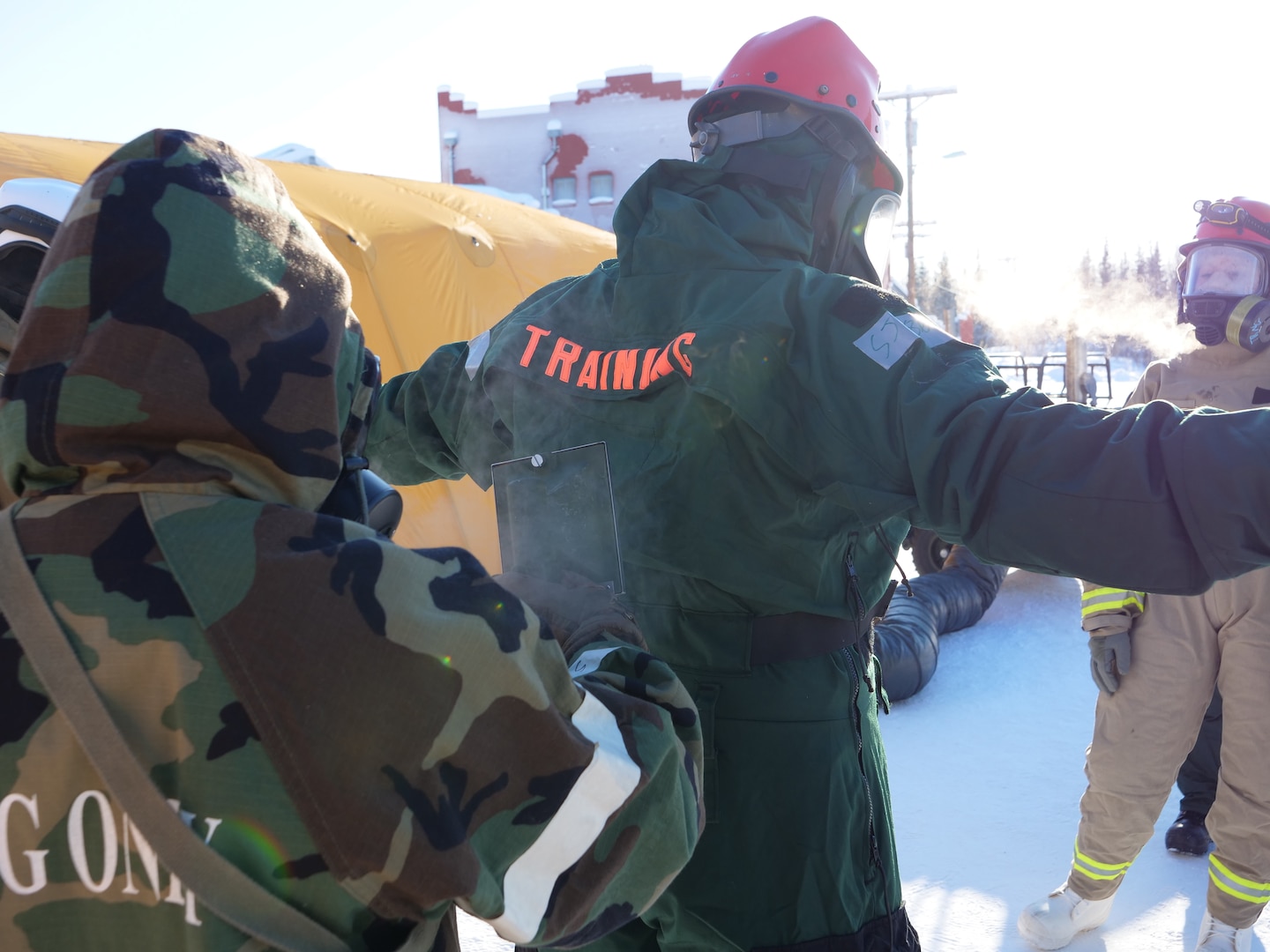 Service members conduct decontamination during the joint force exercise Arctic Eagle 2020 in Alaska. The Indiana National Guard is participating, alongside numerous civilian and federal agencies with approximately 900 other Air and Army National Guard members from 15 states Feb. 20 to March. 7.