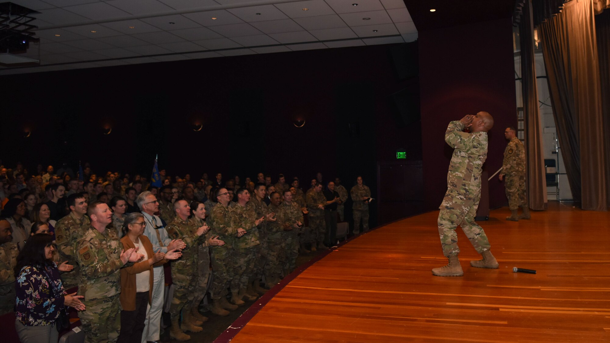 Chief Master Sgt. Daryl Hogan, 30th Space Wing command chief, sounds off the wing’s chant during an all call Feb. 27, 2020, at Vandenberg Air Force Base, Calif. Hogan repeated the chant, “30th Space Wing,” which was followed by “launch and test, above the rest,” from the members in attendance. (U.S. Air Force photo by Senior Airman Aubree Milks)