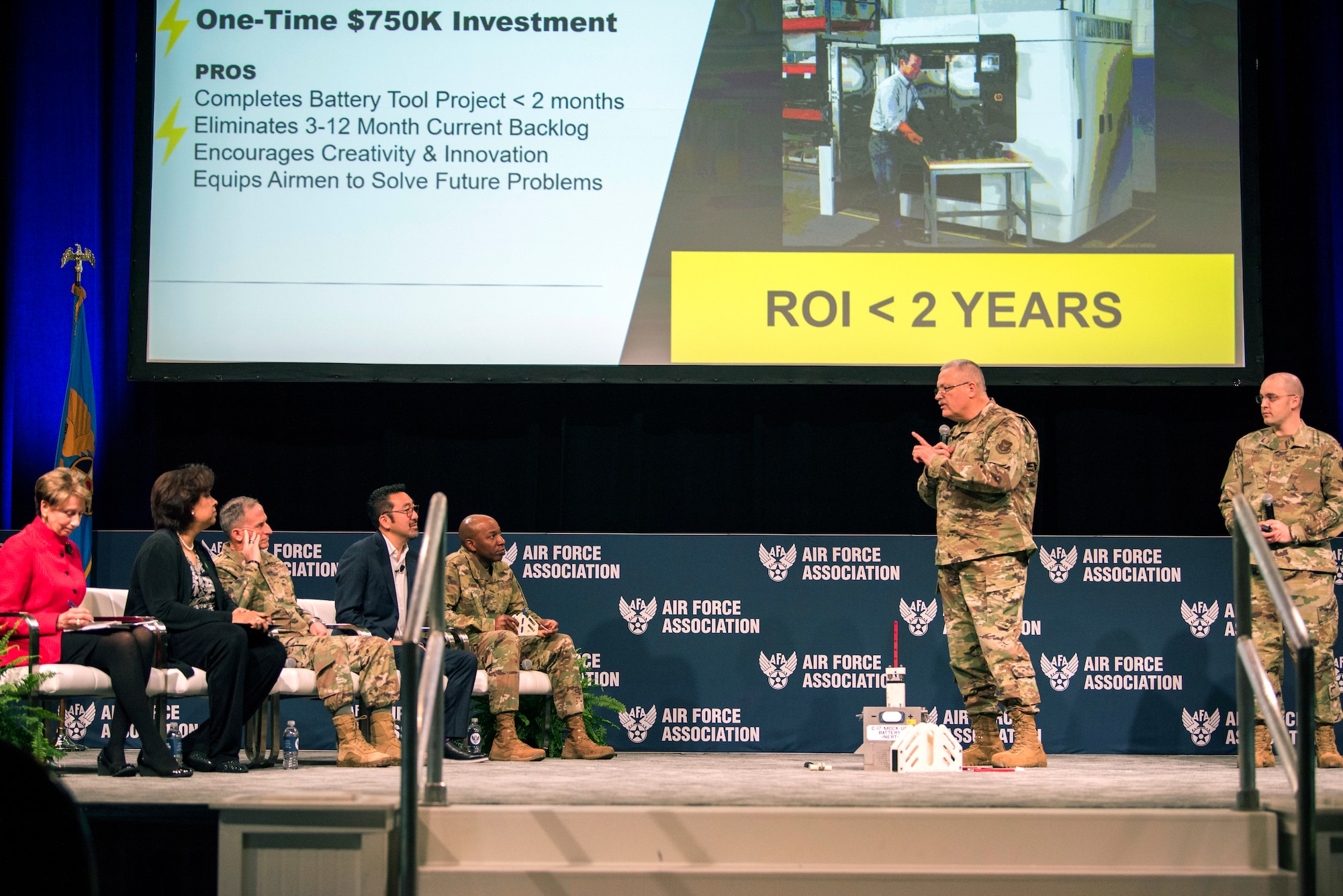 Master Sgt. Roy E. Puchalski pitches the Battery Cell Extraction Tool to Air Force and industry leaders listened to pitches during the Spark Tank 2020 at the Air Force Association's Air Warfare Symposium, in Orlando, Fla., Feb. 28, 2020. The Battery Cell Extraction Tool aids in the removal of battery cells from a C-17 storage battery. The three-day symposium is a professional development forum that offers the opportunity for Department of Defense personnel to participate in forums, speeches, seminars and workshops with defense industry professionals. (U.S. Air Force photo by Staff Sgt. James Richardson)