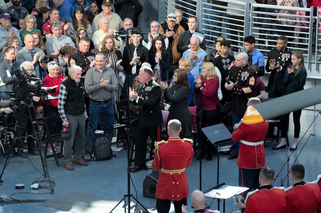 The Sergeant Major of the Marine Corps, Troy E. Black, stands with the crowd to honor Jack Spahr, retired Navy Petty Officer 3rd Class, an Iwo Jima veteran at The President’s Own brass ensemble performance in observance of the 75th anniversary of the battle of Iwo Jima at the National Museum of the Marine Corps in Quantico, V.A., Feb. 23, 2020. The concert was dedicated to Marines and sailors who fought in the battle of Iwo Jima and also thanked veterans who have fought in wars over the last century. (U.S. Marine Corps photo by Sgt. Victoria Ross)